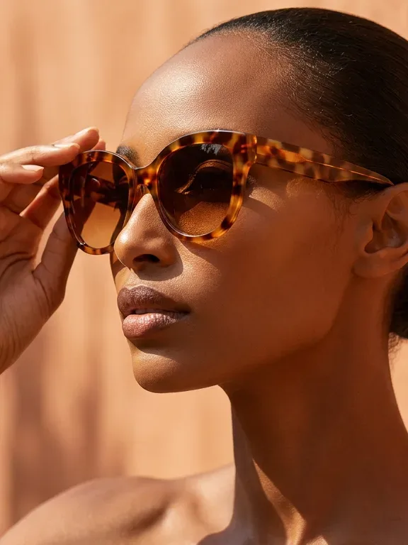 AI-generated sample ad: Meron K. with Sunglasses